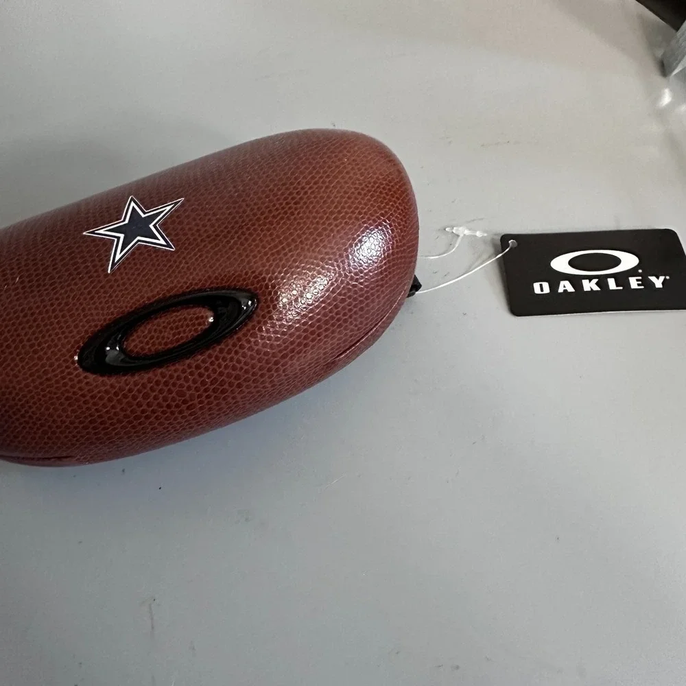 Oakley Dallas Cowboys NFL Football Sunglasses Hard Case Brown Textured Star Logo